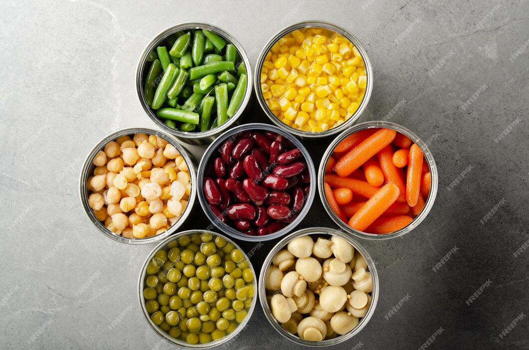 flat-lay-view-canned-vegetables-opened-tin-cans-kitchen-table-nonperishable-long-shelf-life-foods-background_696530-3094.jpg