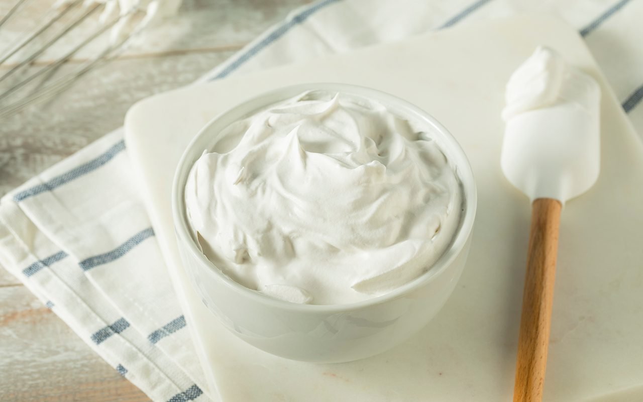 sweet-homemade-vanilla-whipped-cream-873059520.jpg