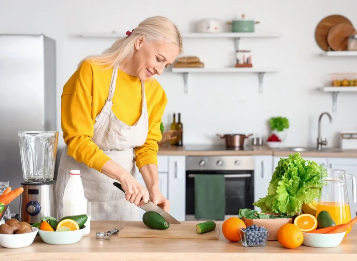 woman-cutting-food.webp