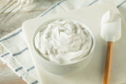 sweet-homemade-vanilla-whipped-cream-873059520.jpg
