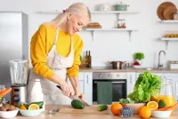 woman-cutting-food.webp