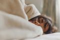 woman-wrapped-blanket-bed-fb-j.jpg